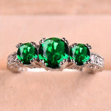 Timeless Ring with Shimmering Emerald Stone